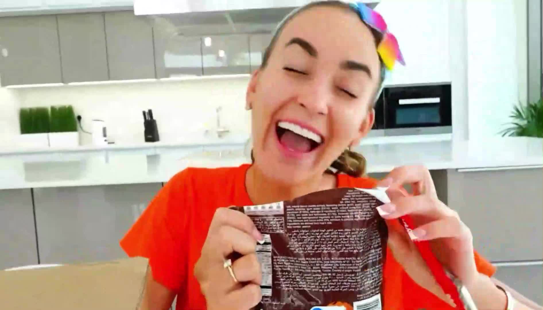 Look at this happy girl! She's so excited to open a bag of delicious snacksโher big smile and joy make snack time extra fun! ๐โจ In the cozy kitchen, she can't wait to take a bite and enjoy every moment. What a cute and yummy video for little snack lovers! ๐ฟ
