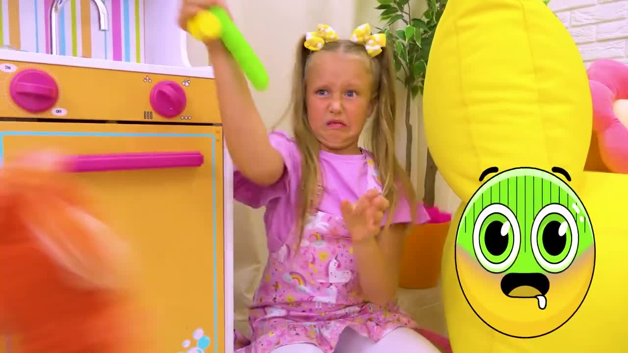 A cute little girl is having a fun time with her funny toy friend! They’re pretending to cook in a colorful toy kitchen, using playful tools and lots of giggles—perfect for a day of imaginative play! 🥰✨