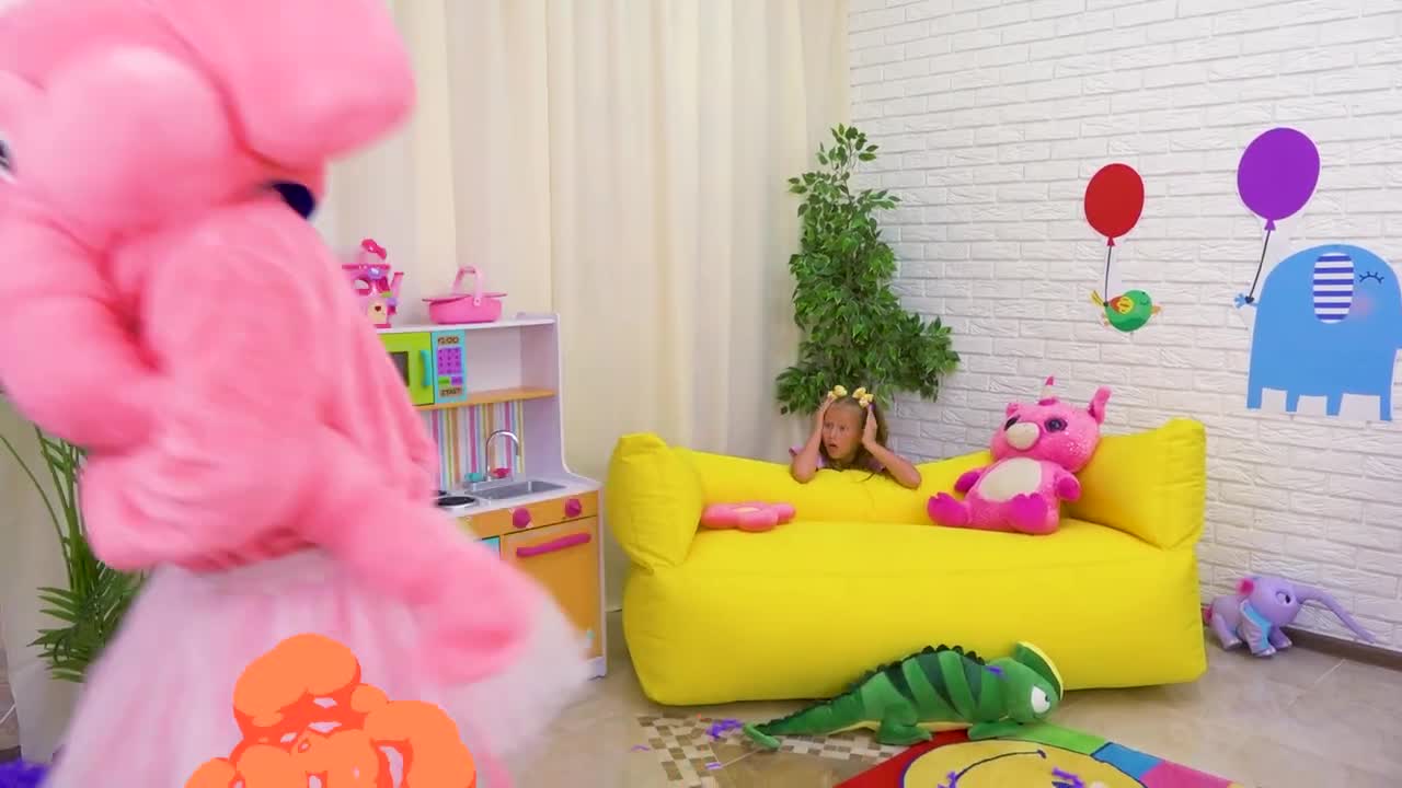 A little girl is surprised by a playful pink elephant in her colorful playroom! 🌈 They explore with toy kitchens, giant plush toys (like a pink dragon 🐉 and green lizard 🦎), and balloon decorations. Full of giggles and fun, it's a sweet adventure for kids! 🧸🍭