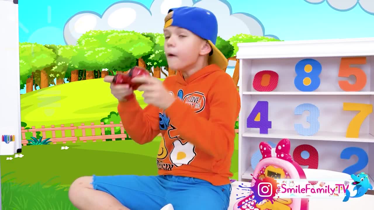 Watch this cute kid having a blast with his red toy! He's playing and learning numbers with colorful toys and a vibrant cartoon background. Join Smile Family TV for exciting, playful learning adventuresโperfect for little ones! ๐ #KidsToys #LearningNumbers #FunPlay