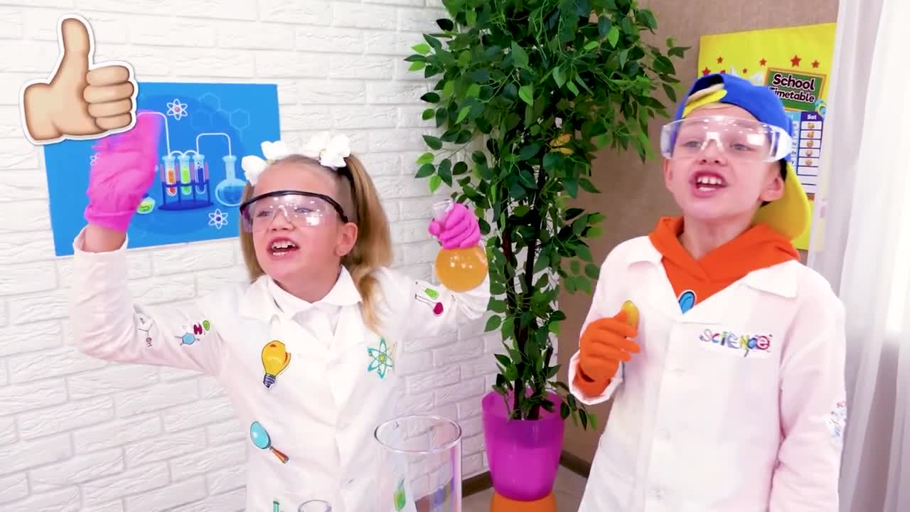 Two adorable kids dressed as little scientists have the best time mixing colorful potions in the lab! They wear cool goggles and gloves, shake test tubes, and watch as the yellow liquid fizzes and changes—so much fun and learning for little ones! Perfect for a playful science adventure! 💡🔬
