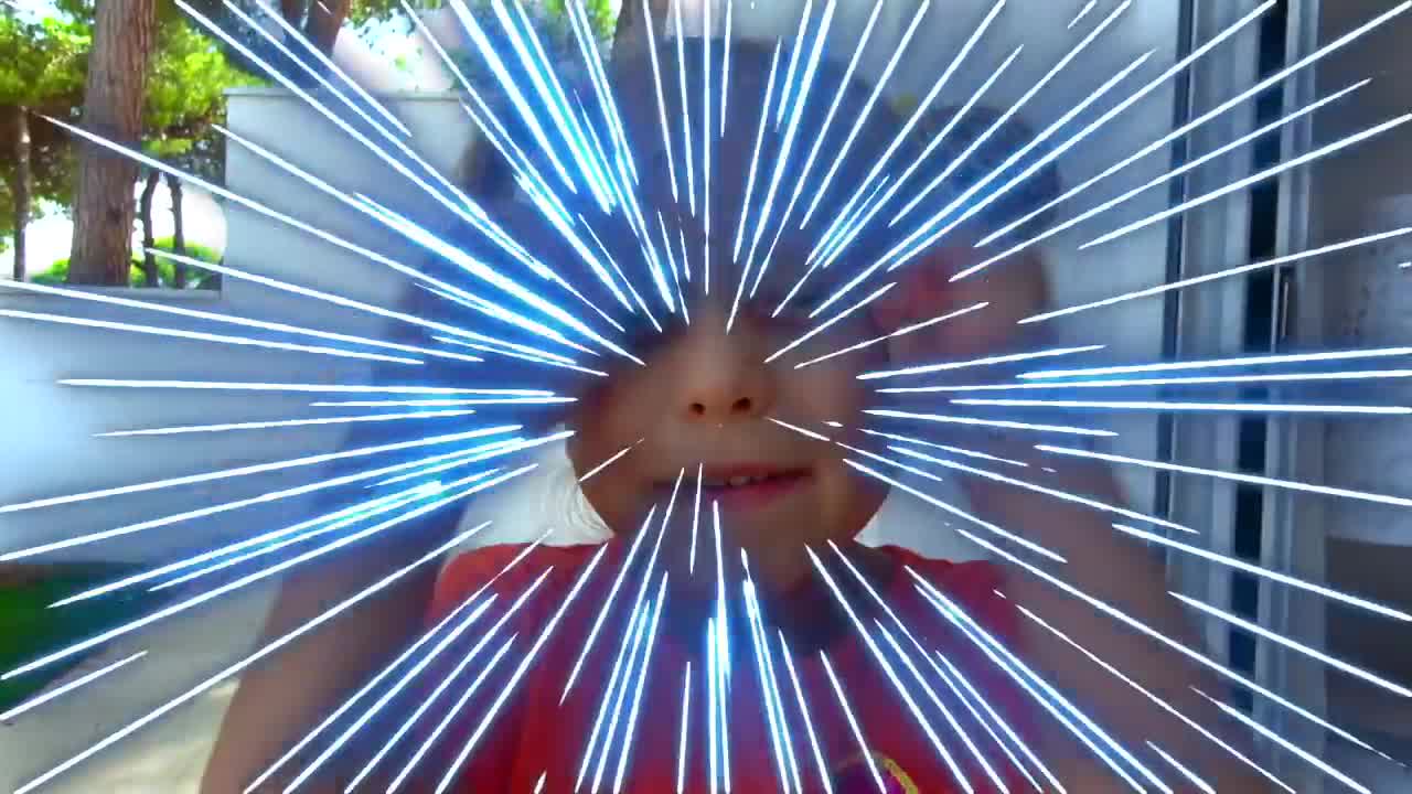 Cute little kid playing with sparkly light effects—they look so happy and excited! 🎉 A fun moment of joy and magic! 💥