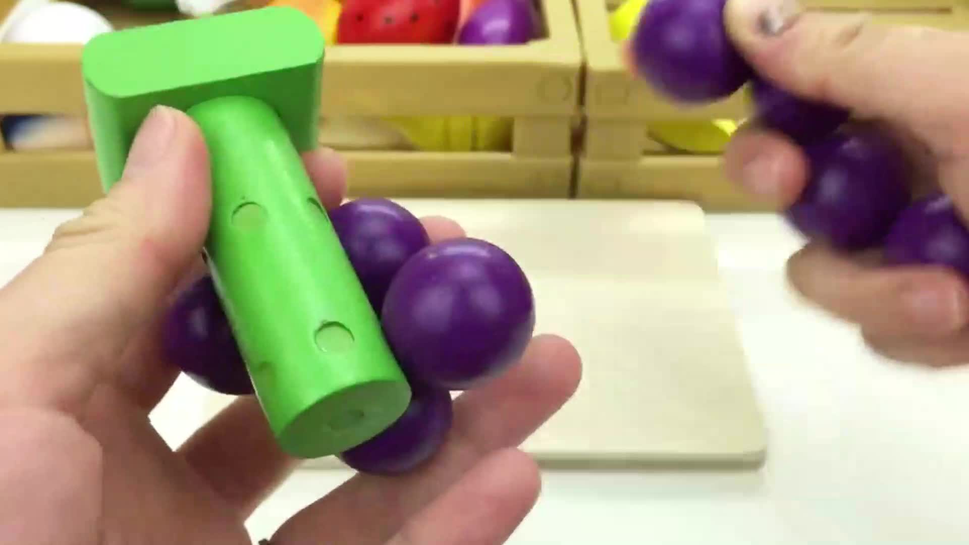 Watch this fun playtime video! A little hand holds a bright green foam hammer, and purple balls are being popped into its holes. There are colorful toys in the background, making it super engaging for kids! It's a great way to learn about colors, practice hand-eye coordination, and have a blast with simple, playful activities. Perfect for little ones who love hands-on fun! 🧸👶