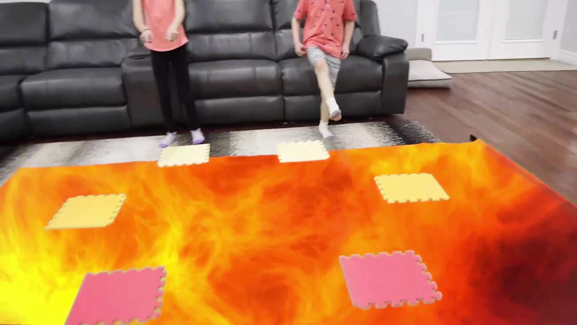 Watch these two kids have a blast playing on a fun flaming floor mat! They’re stepping on colorful puzzle tiles, laughing and moving—perfect for active playtime! 🎮✨