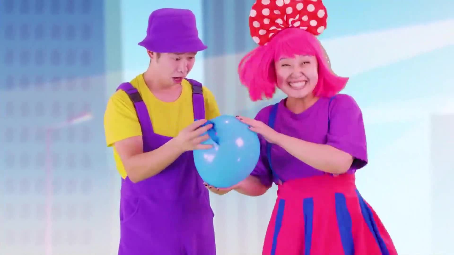 Two vibrant characters in fun purple and pink outfits are playing with a big blue balloon! Full of laughter and playful energy, this cheerful scene is perfect for little ones to enjoy! 🎈🌈