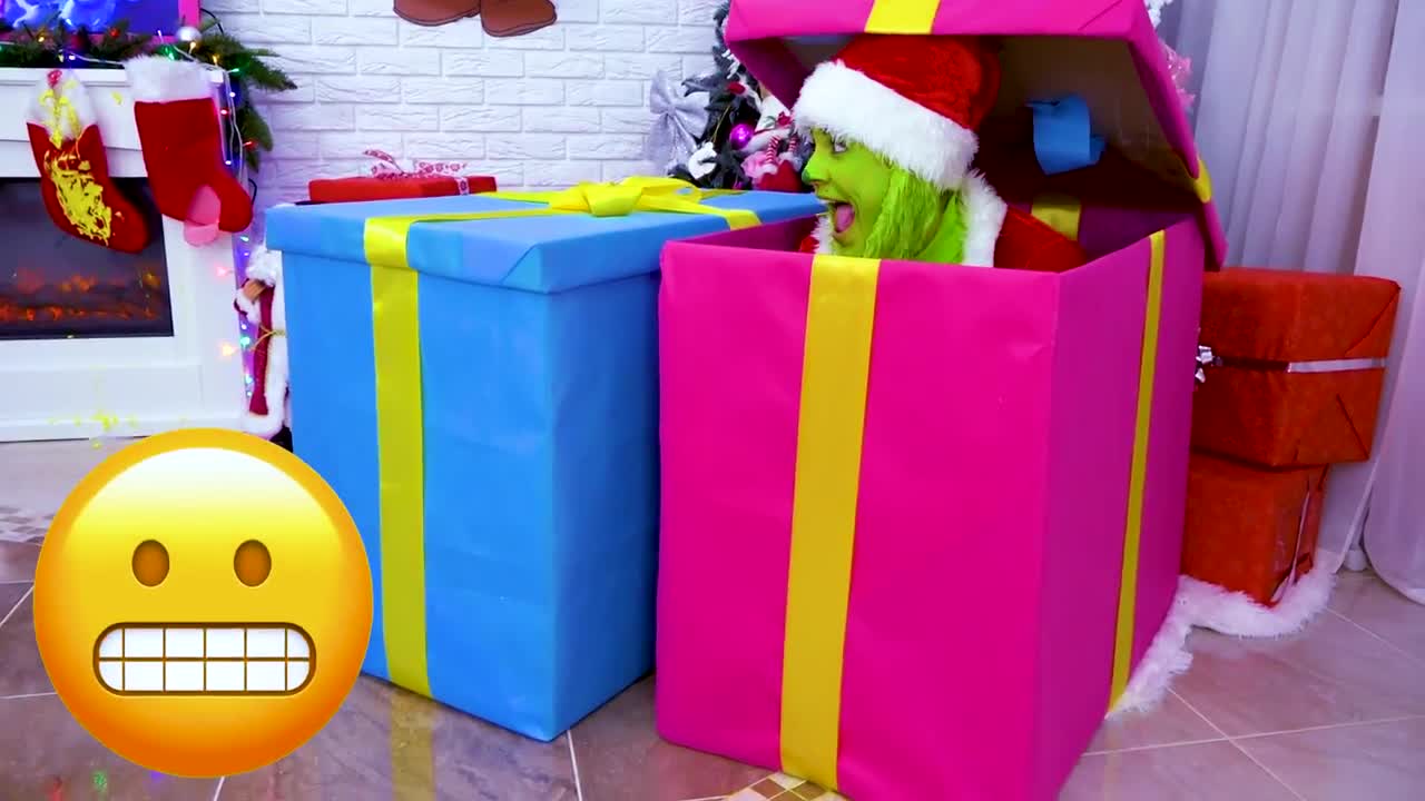Look who’s here for Christmas cheer! 🎄 The Grinch is hiding in a big, sparkly pink present—he’s ready to surprise everyone! 🎉 With colorful gifts, twinkling lights, and cozy holiday vibes, this is the best Christmas ever! 😊 Watch as he pops out with a huge grin—what do you think he’s going to give? 🌟 #GrinchMagic #ChristmasSurprise
