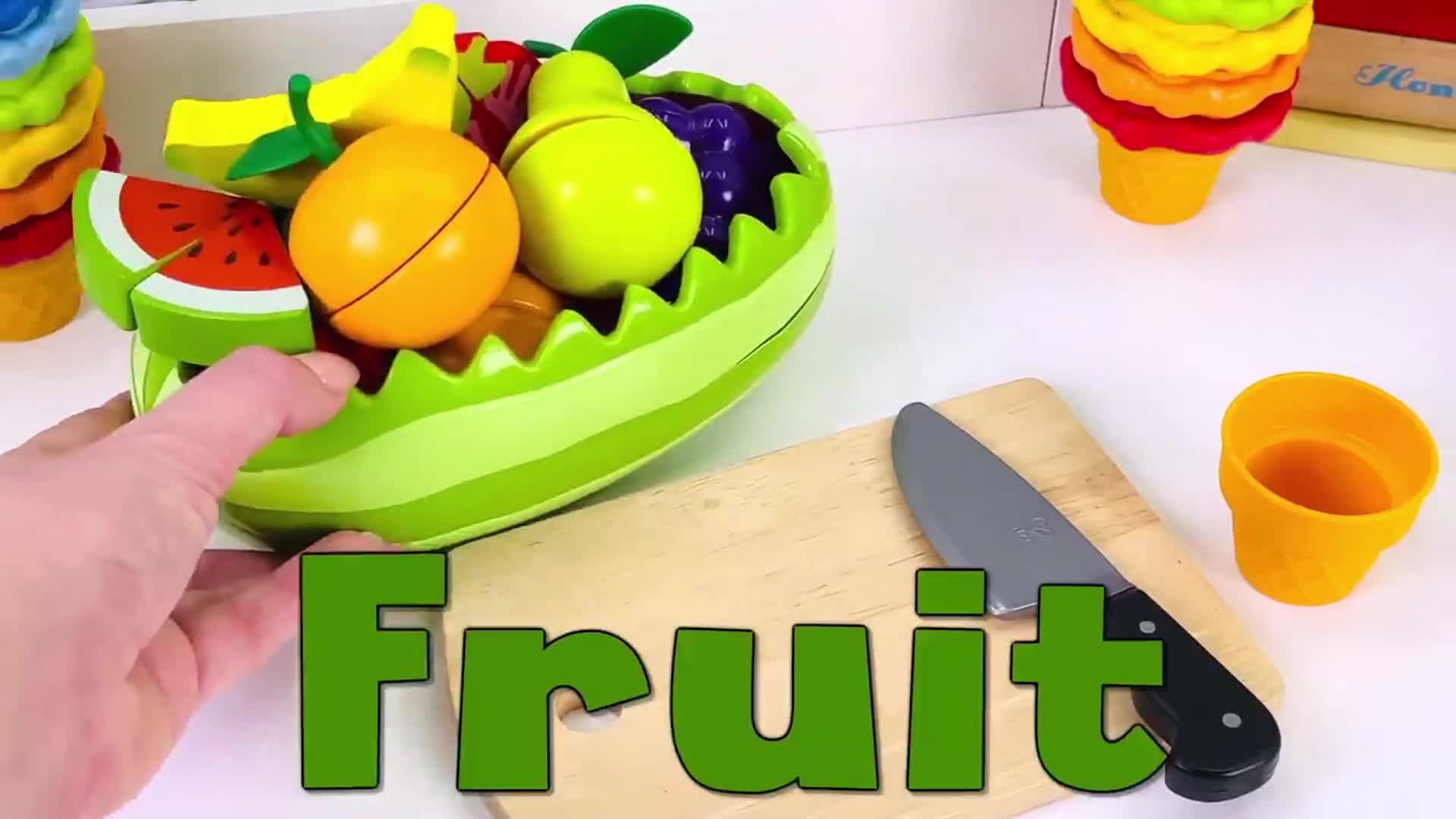Join us in a colorful playtime adventure! Explore a vibrant toy fruit basket filled with banana, orange, watermelon, pear, and more. Use the toy knife to 'cut' and discover different fruits—great for little ones learning about fruits and having fun! 🍎🍌🍉