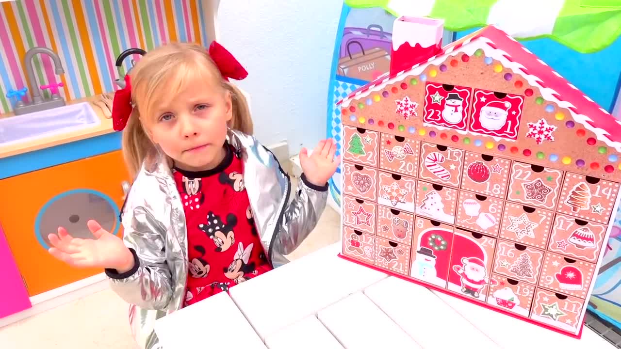 Mia is thrilled to open her super cute gingerbread house advent calendar! 🏠✨ Each day, she'll peek behind the numbered doors to find fun surprises—adorable toys, sweet treats, and magical little gifts! Watch as she counts down to Christmas with this festive, sparkly holiday activity! 🎁🥳